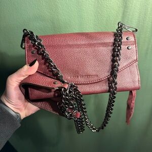 Burgundy crossbody purse with black chain